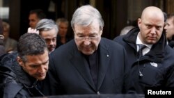 FILE - Australian Cardinal George Pell leaves at the end of a meeting with the victims of sex abuse, at the Quirinale hotel in Rome, Italy, March 3, 2016. (REUTERS/Alessandro Bianchi)