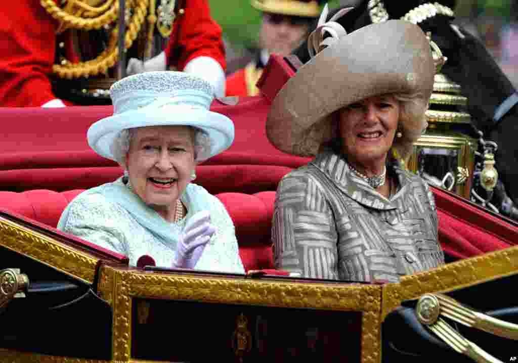 The Queen departs St Paul's Cathedral with the Dean of St Paul's David Ison, left, following a service of thanksgiving on the last day of the Queen's Diamond Jubilee celebrations.