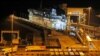 Lorries disembark the first ferry that arrived after the end of the transition period with the EU at the port in Dover, Jan. 1, 2021. 