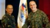 U.S. Marine Brigadier General Richard Simcock (R) shakes hands with Philippines Armed Forces Major General Virgilio Domingo after the opening ceremony of annual Philippines-U.S. military exercise in Manila, April 5, 2013. 