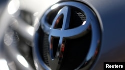 The Toyota logo is seen on a car in Sao Paulo, Brazil, June 2, 2017. Toyota has said it will make automatic emergency braking standard on nearly all its U.S. models by the end of 2017.