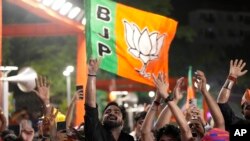Bharatiya Janata Party supporters shout slogans as they listen to Prime Minister Narendra Modi at the party headquarters in New Delhi, India, on June 4, 2024. The party did not fare as well in parliamentary elections as forecasters and exit polls had predicted.