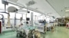 FILE - Patients suffering from the coronavirus disease are seen in the intensive care unit at the Papa Giovanni XXIII hospital in Bergamo, Italy, May 12, 2020.
