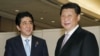 习近平邀安倍观阅兵 秀肌肉警告日本