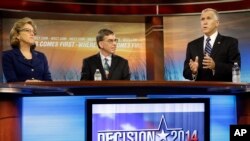 Sen. Kay Hagan, D-N.C., left, and Libertarian Party Senate candidate Sean Haugh, center, listen as North Carolina Republican Senate candidate Thom Tillis speaks during a debate on Oct. 9, 2014. (AP Photo/Gerry Broome, Pool)