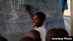 A young boy at the Mugosi Primary School, which mainly serves children from the Kahe refugee camp in the Democratic Republic of the Congo