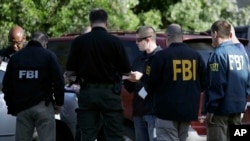 Jami'an FBI suna binciken lamarin har sai sun kai ga kama wani ko wasu