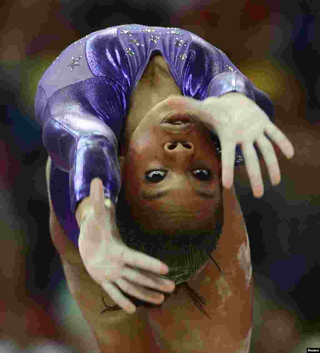Gabrielle Douglas of the U.S. performs on the balance beam during the women's gymnastics qualification at the North Greenwich Arena during the London 2012 Olympic Games July 29, 2012.