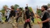 Pakistani Security Clears Protesters From State TV Station