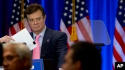 FILE -- Paul Manafort appears on stage ahead of Republican presidential candidate Donald Trump, in New York, June 22, 2016.